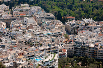 Fototapeta na wymiar Athens buildings' rooftops from Saint George Chapel of Likavittos view point