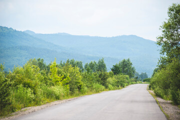 Fototapeta premium the road leading to the mountains