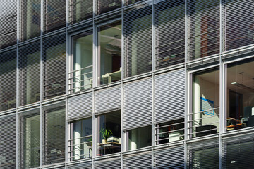 office building windows with external venetian blinds