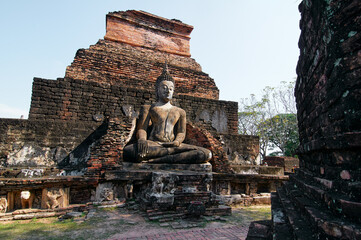 Sukhothai Wat Mahathat Buddha statues at Wat Mahathat ancient capital of Sukhothai Thailand. Sukhothai Historical Park is the UNESCO world heritage