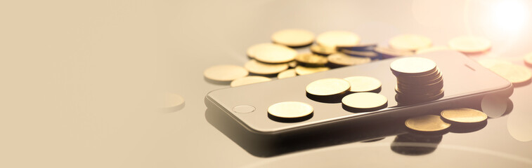 Background for business ideas design. Financial investment concept. Stack of coins with smartphone. web banner design.