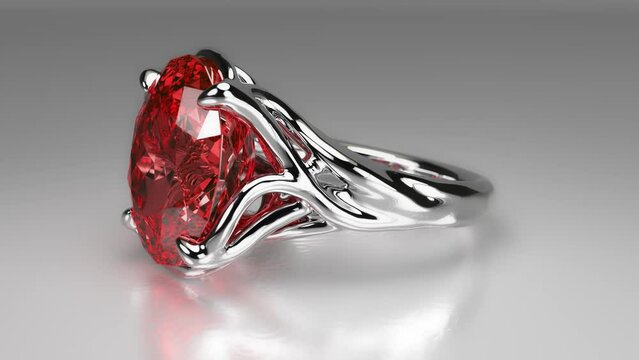 Ring with a large red stone and floral design. 3d animation