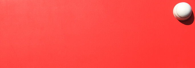 Red wall, texture, background. The wooden wall, painted with enamel paint. Flat surface in reddish...