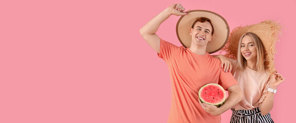 Young couple with juicy watermelon on pink background with space for text