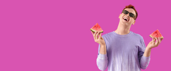 Young man with pieces of juicy watermelon on purple background with space for text