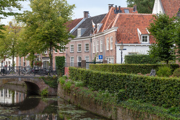 Fototapeta na wymiar Historic buildings along the canal in the center of the medieval city of Amersfoort.