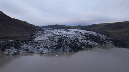 Aerial view of the Solheimajokull is an outlet glacier of the mighty icecap of Myrdalsjokull on the South Coast of Iceland. It is the fourth-largest ice cap in Iceland.