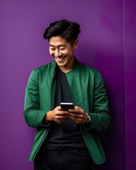  Man Holding Phone Against Purple Wall. Generative AI.