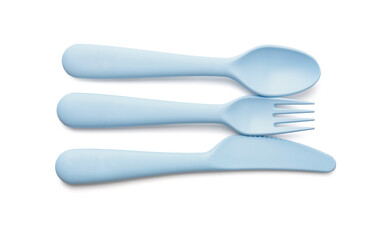 Plastic eating utensils for baby on white background