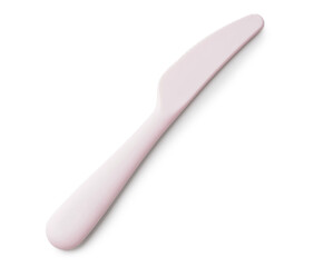 Plastic knife for baby on white background