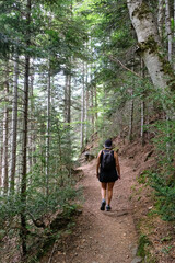 Woman trekking in the forest