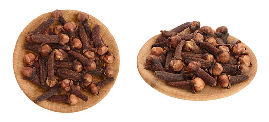 Dry spice cloves in wooden bowl isolated on white background . Top view. Flat lay