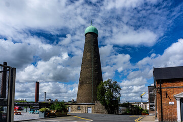Naklejka premium St Patricks Tower, in Thomas Street Dublin, Ireland. Built in 1757 it was originally part of Roe Distillery it is now part of Dublins Digital Hub.