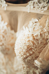 Fototapeta na wymiar The bridal allure is in the details: a close look at the lace-adorned bodice tells a tale of love.