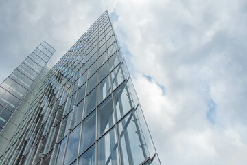 Long angle view of a business office building on a cloudy sky background in Stuttgart