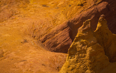 Abstract Rustrel canyon ocher cliffs landscape. Provencal Colorado near Roussillon, Southern France.