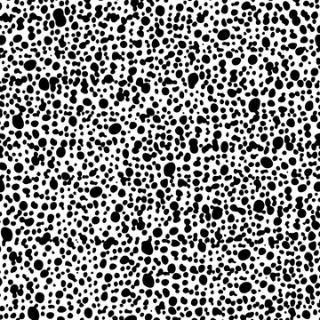 Thick seamless grainy hand drawn texture of casual black ink blots on white background; shagreen vector surface design