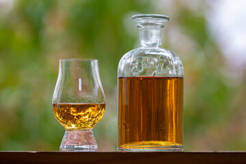 Single malt scotch whisky in selective focus and minimalistic photo. Space for text