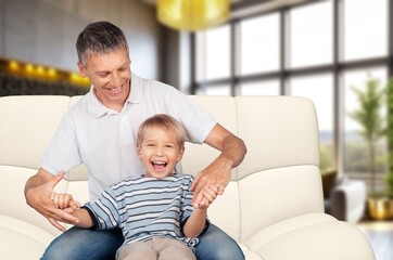 Obraz premium Happy young father and child at home together, AI generated image