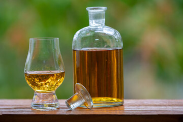 Single malt scotch whisky in selective focus and minimalistic photo. Space for text