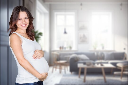 Happy smiling pregnant woman at home, AI generated image