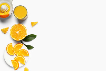 Glass of fresh orange juice and juicer on white background
