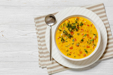 Beer cheese soup with vegetables and thyme