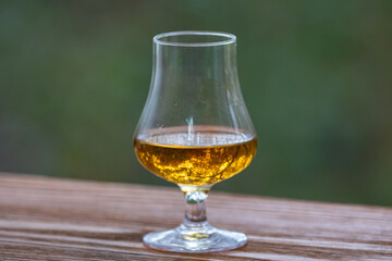 Single malt scotch whisky in selective focus and minimalistic photo. Space for text