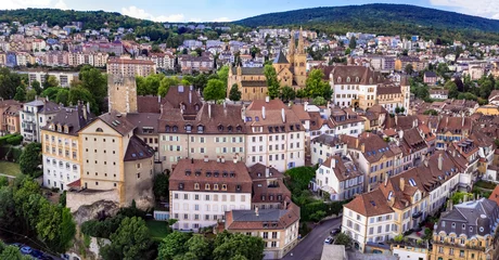 Foto op Plexiglas Switzerland travel and scenic places. Aerial drone view of Neuchatel charming town and impressive medieval castle overlooking the lake © Freesurf