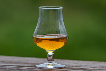 Single malt scotch whisky in selective focus and minimalistic photo. Space for text