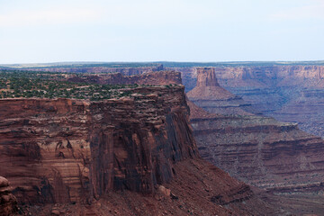 canyon mesas under a misty blue sky at canyonlands national park