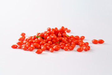 Fresh goji berries on a white background