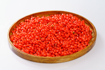 Fresh goji berries on a white background