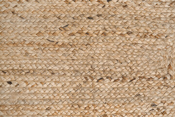 Closeup view of stylish wicker rug as background