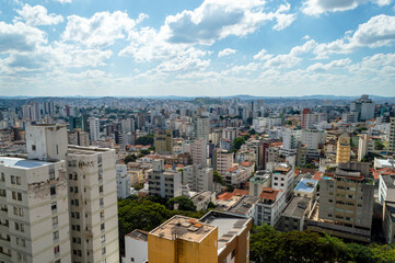 Panorama of several residential buildings seen from above in the city of Belo Horizonte. Vehicle traffic.