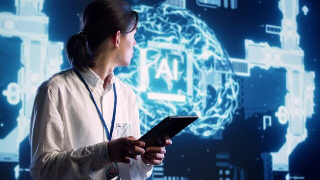Asian developer using tablet to implement artificial intelligence parallel processing, breaking up complex computational tasks into smaller bits, enabling AI systems to process more input data faster