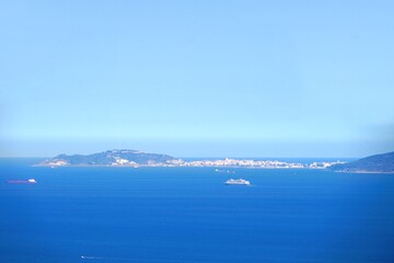 Fototapeta na wymiar Ceuta: View from the Mirador del Estrecho viewpoint in Andalusia over the Strait of Gibraltar towards the Spanish autonomous city Ceuta, Africa, Spain