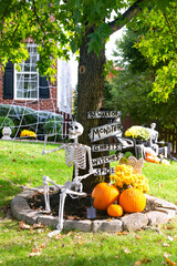Skeletons, pumpkins and skulls are traditional attributes of Halloween in America. Frontyard...