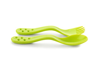 Colorful cutlery for baby on white background