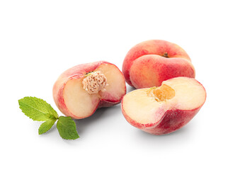 Sweet fig peaches and mint on white background