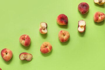 Sweet fig peaches on green background