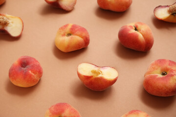 Sweet fig peaches on brown background