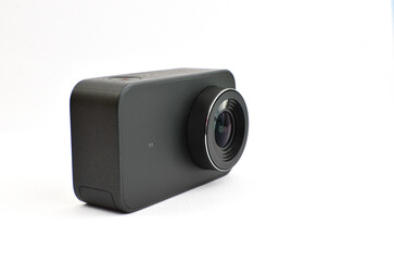 A powerful black 4K action camera waiting to document your incredible experiences from that table.