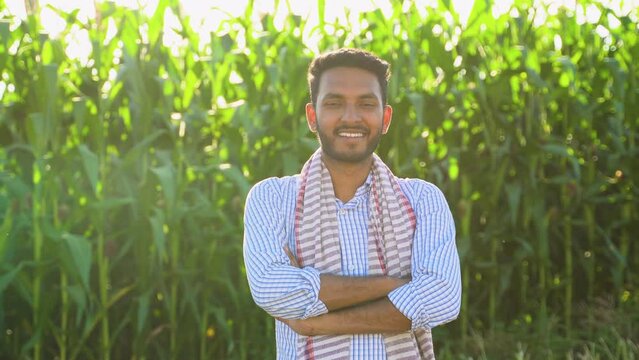 Portrait of indian farmer on corn field