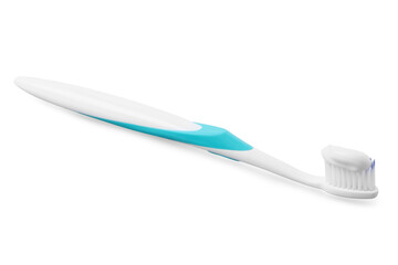 Plastic toothbrush with paste on grey background