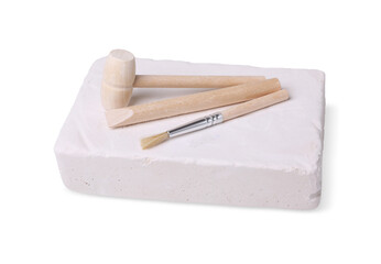 Educational toy for motor skills development. Excavation kit (plaster, digging tools and brush) on white background