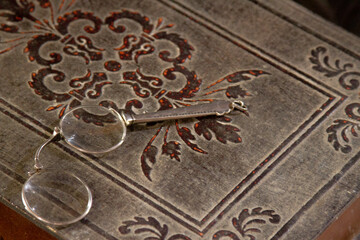 Antique book and medical equipment.