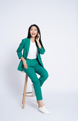 Portrait of young Asian business woman on white background