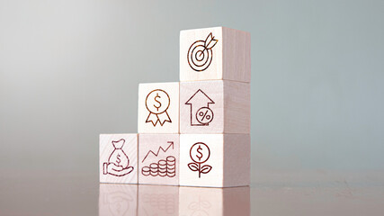 People hand arranging wood block stacking with business strategy and Action plan,targeting the business concept.business development concept.