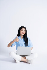 Photo of young Asian girl on white background